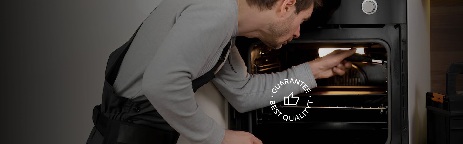 Fuse Tech repairing the oven