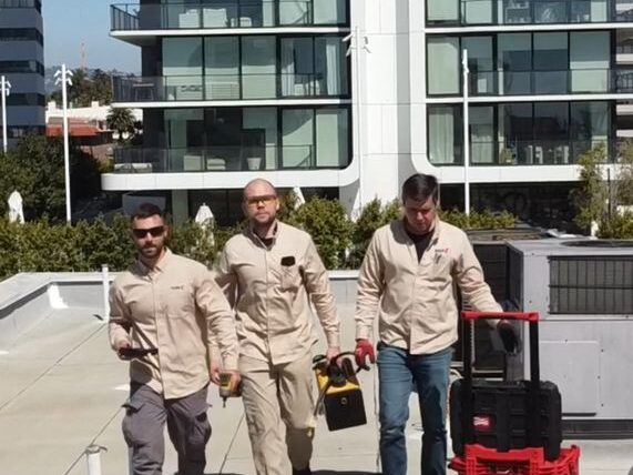 Fuse Techs walking with equipment appliance repair reston