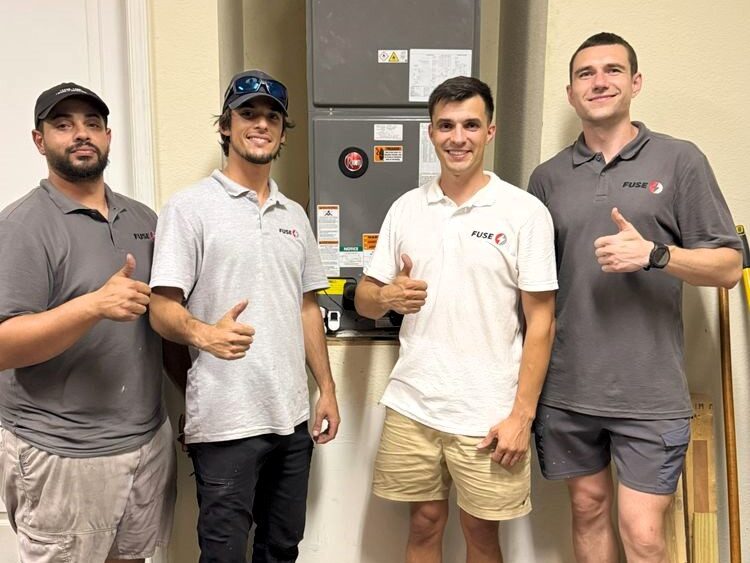 Fuse workers posing with thumbs up appliance repair reston
